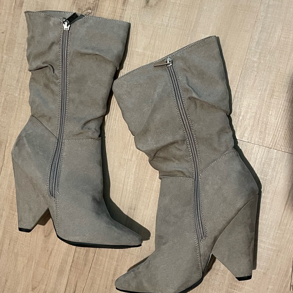 Gray boots, never used . NWOT